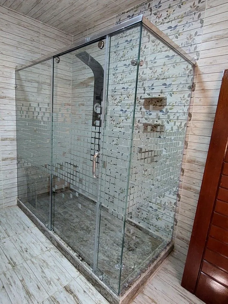 Frameless sliding glass shower door with stainless-steel top rail — BlueCrest, Egypt